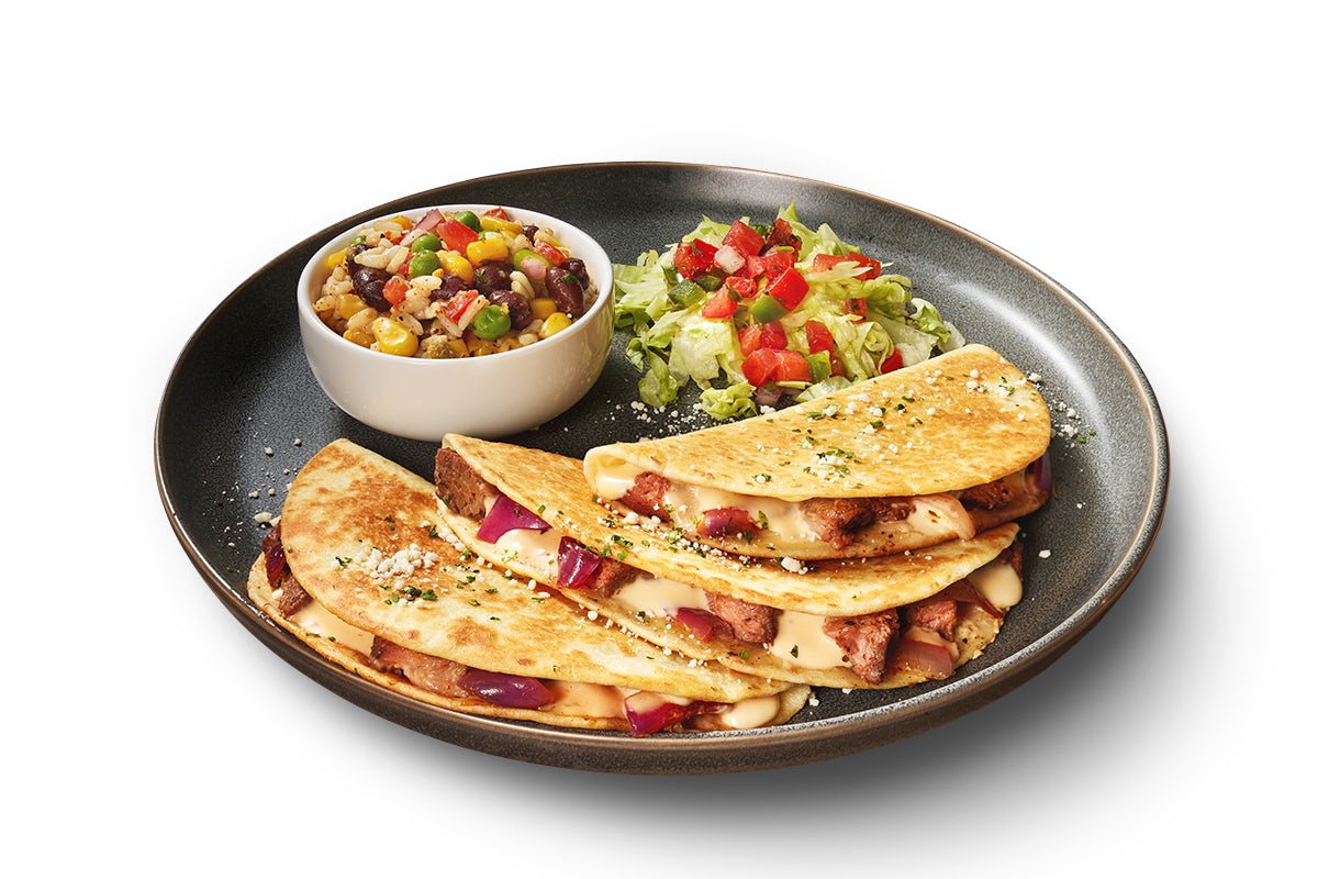 Order Steak Tacodilla food online from Ruby Tuesday store, Thomasville on bringmethat.com