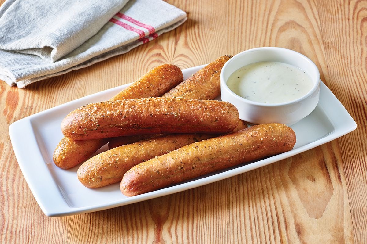 Order Breadsticks with Alfredo Sauce food online from Applebee's store, Royersford on bringmethat.com