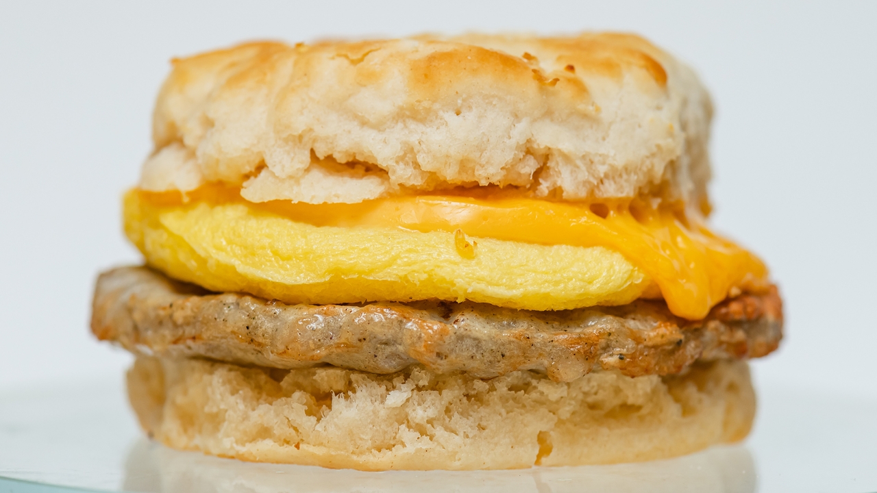 Order Biscuit Sandwich with Sausage, Egg & Cheese food online from The Human Bean store, Lexington on bringmethat.com