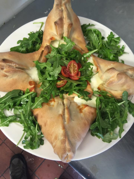 Order Large Calzone food online from Cioffi Restaurant & Pizzeria store, Union on bringmethat.com