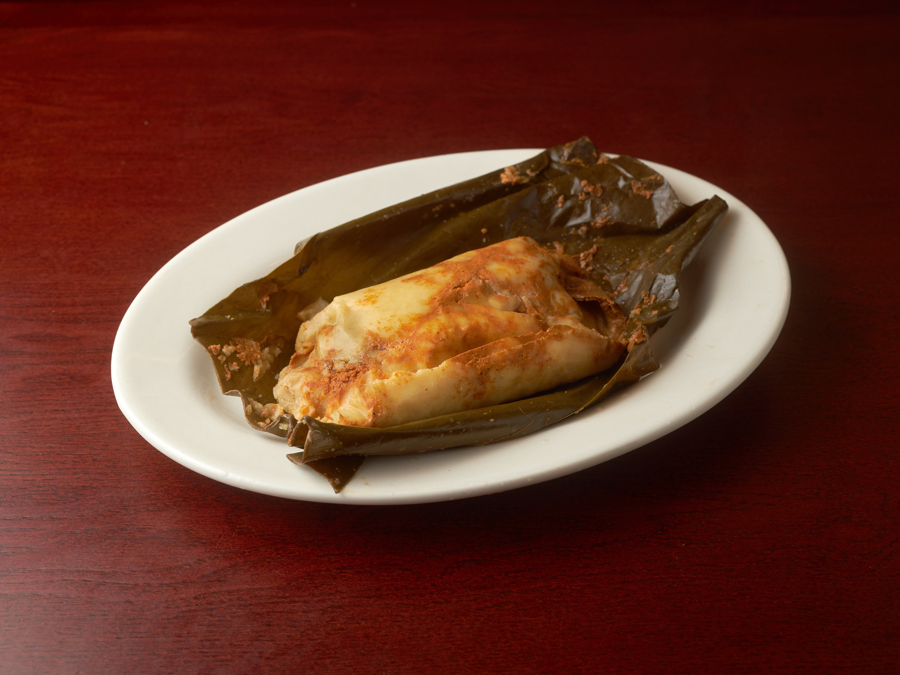 Order Tamales de pollo food online from Don Miguel Restaurant store, Jamaica on bringmethat.com