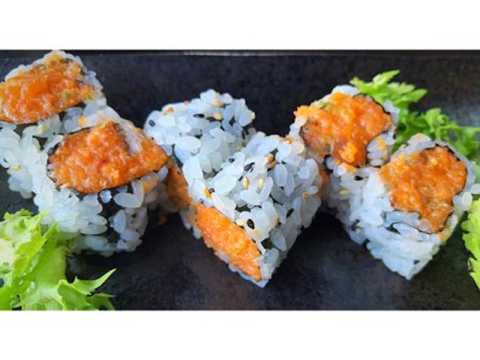 Order Spicy Salmon Roll food online from Takumi Hibachi Sushi & Lounge store, Bay Shore on bringmethat.com
