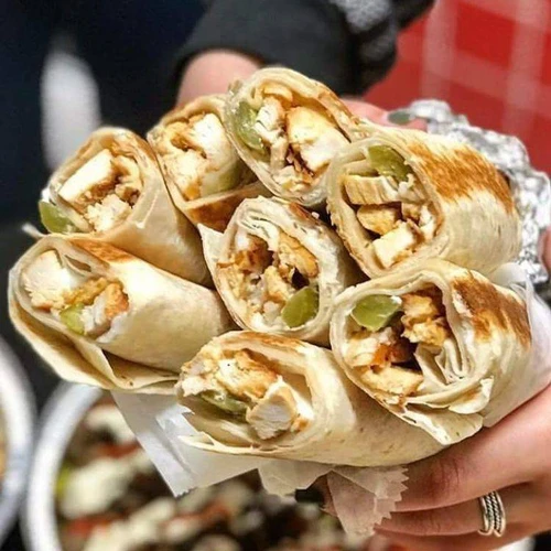 Chicken shawarma wrap with fries from Roma Pizza