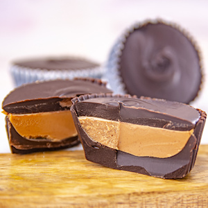 Order Jumbo Dark Peanut Butter Cups, 3 pc. food online from Wockenfuss Candies store, Columbia on bringmethat.com