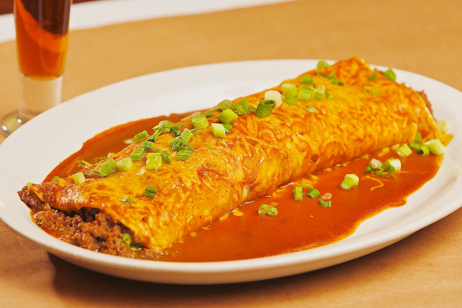 Order Lil Bob's Smothered Burrito food online from La Cucaracha Mexican Restaurante store, Saint Paul on bringmethat.com