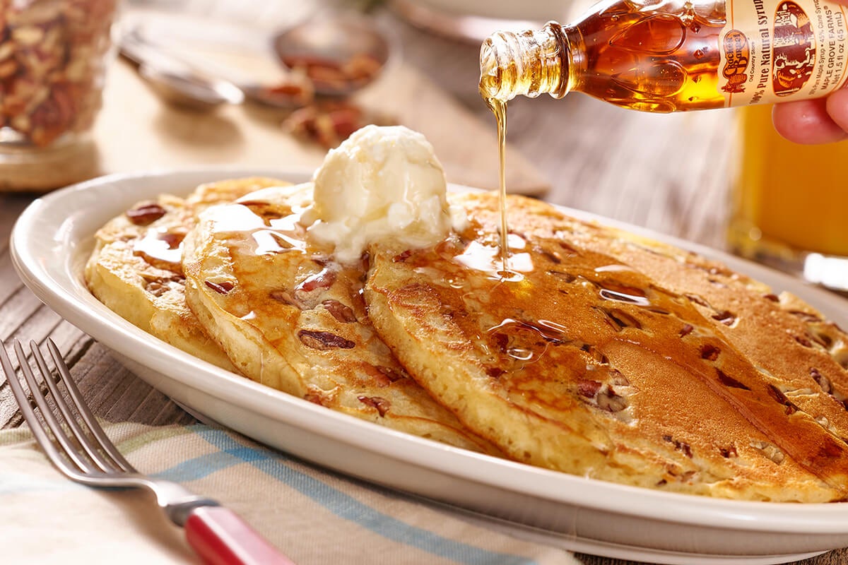Order Pecan Pancakes food online from Cracker Barrel store, Rochester on bringmethat.com