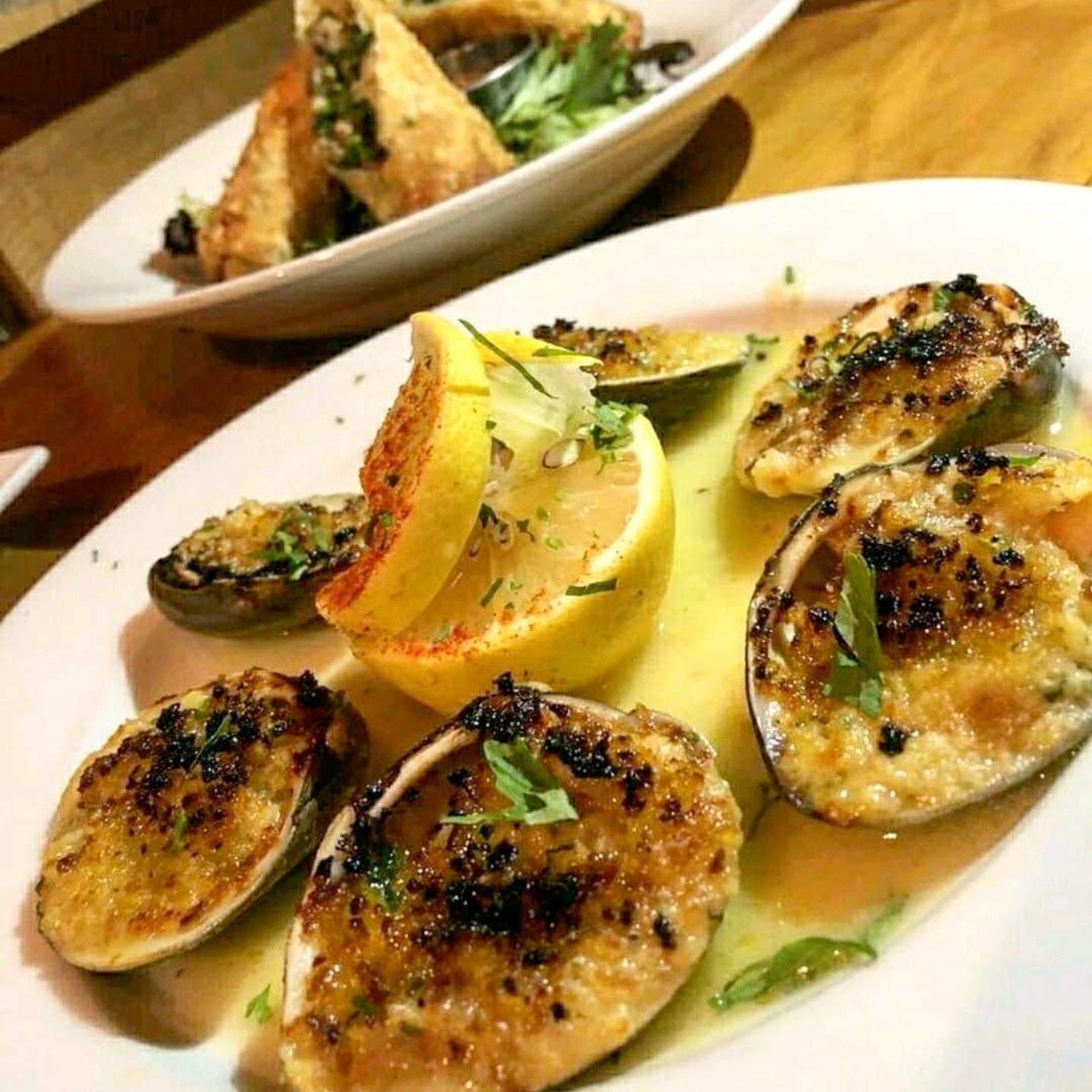 Order Baked Clams Oreganata food online from Viaggio store, Rockville Centre on bringmethat.com