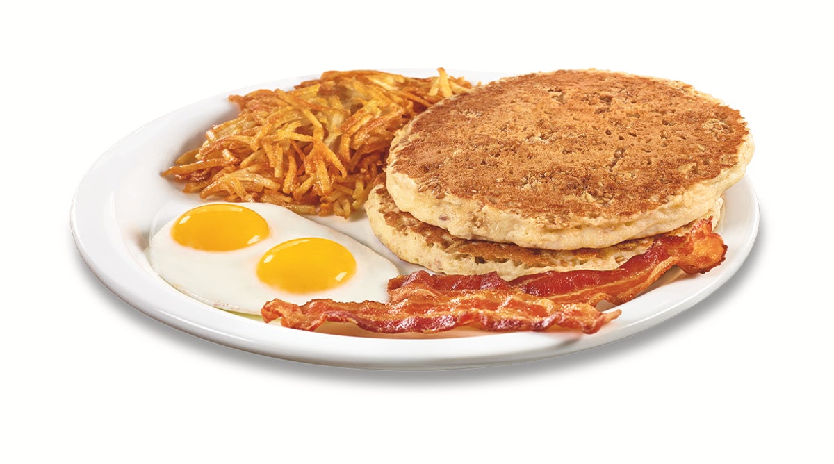 Order Hearty 9-Grain Pancake Breakfast  food online from Denny's store, Thomasville on bringmethat.com