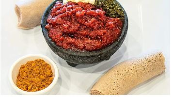 Order Tuna Kitfo food online from Makeda Ethiopian Restaurant store, Alexandria on bringmethat.com