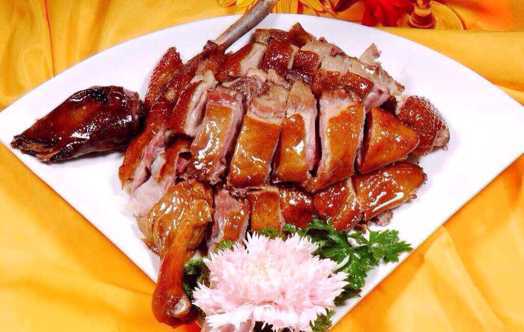 Order D17. Smoked Tea Duck food online from Shu Han Ju Chinese Restaurant store, New York on bringmethat.com