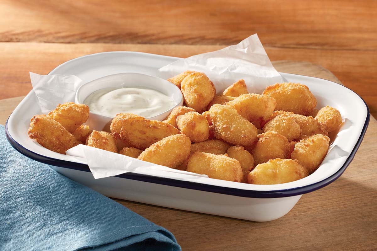 Order White Cheddar Cheese Bites food online from Cracker Barrel store, Rochester on bringmethat.com