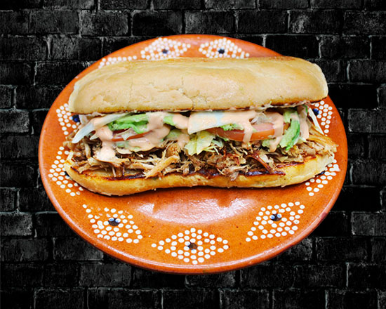 Order Carnitas Torta food online from Rivas Mexican Grill#4 store, Henderson on bringmethat.com