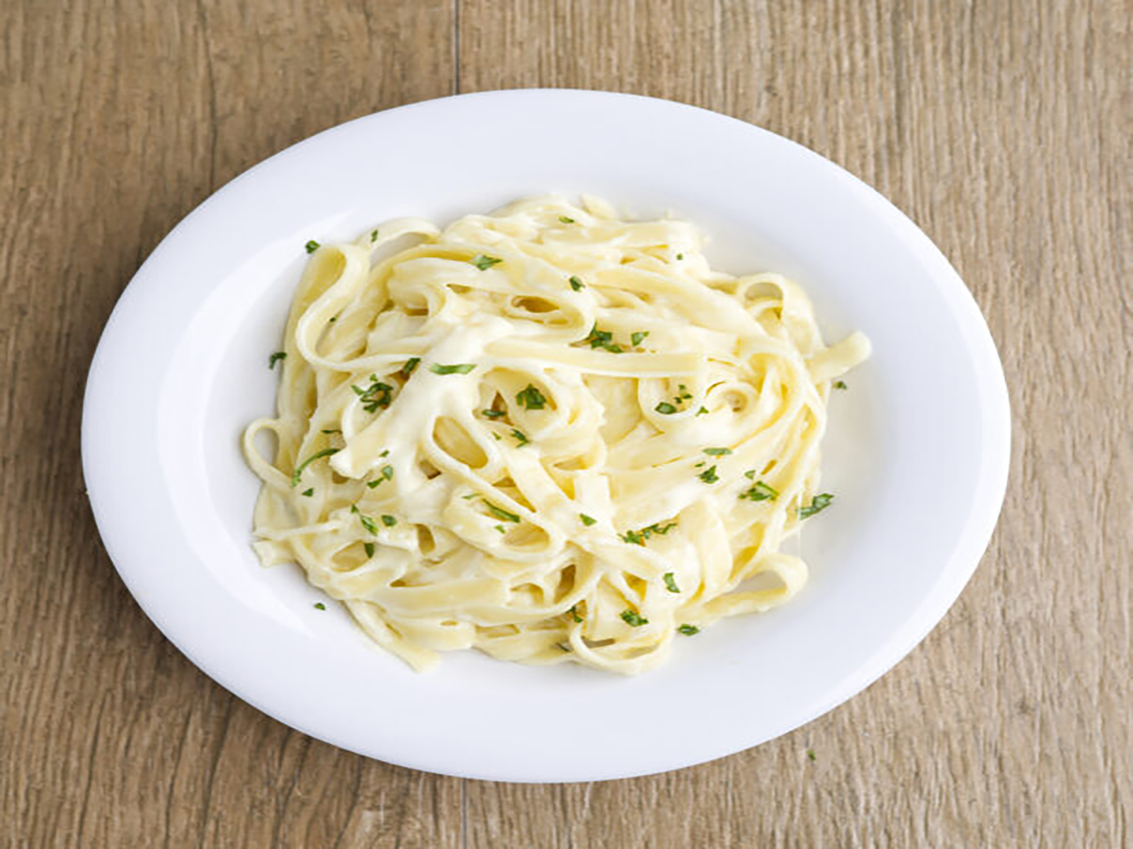 Order Fettucini Alfredo food online from Buccaneer Pizza store, Santa Ana on bringmethat.com