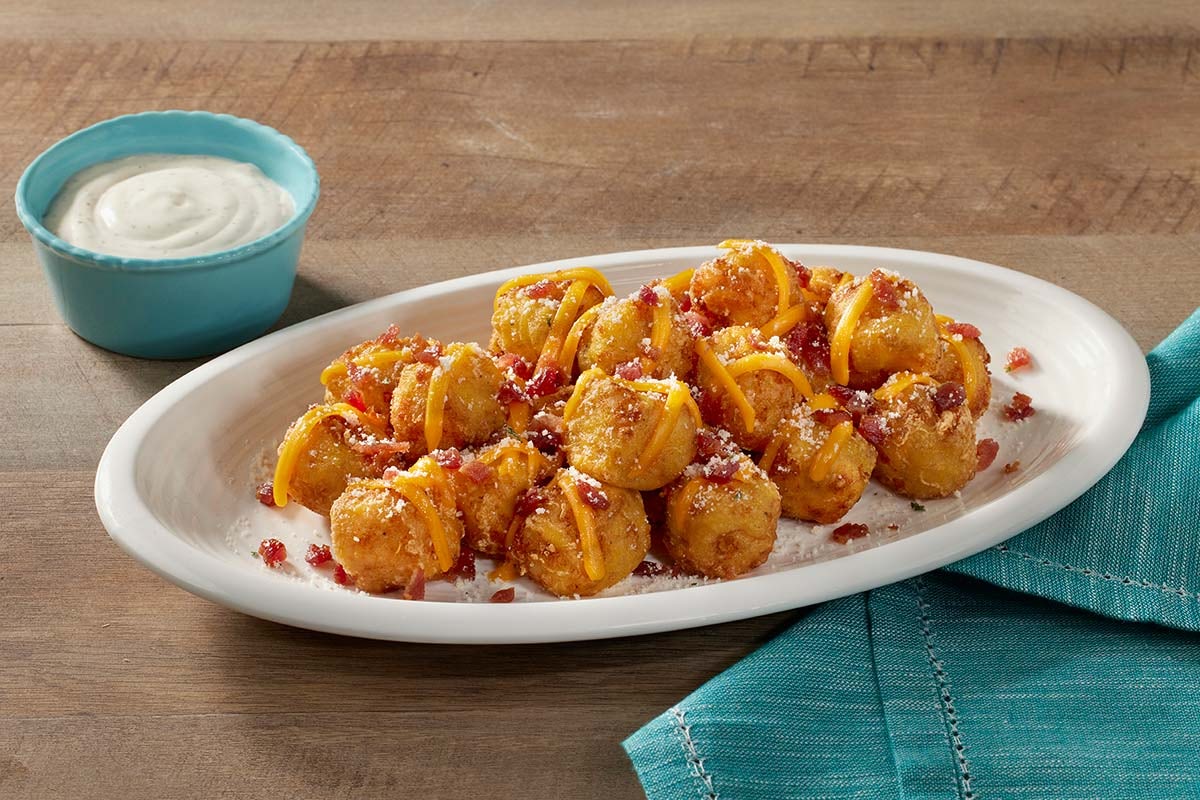 Order Loaded Hashbrown Casserole Tots food online from Cracker Barrel store, Rochester on bringmethat.com