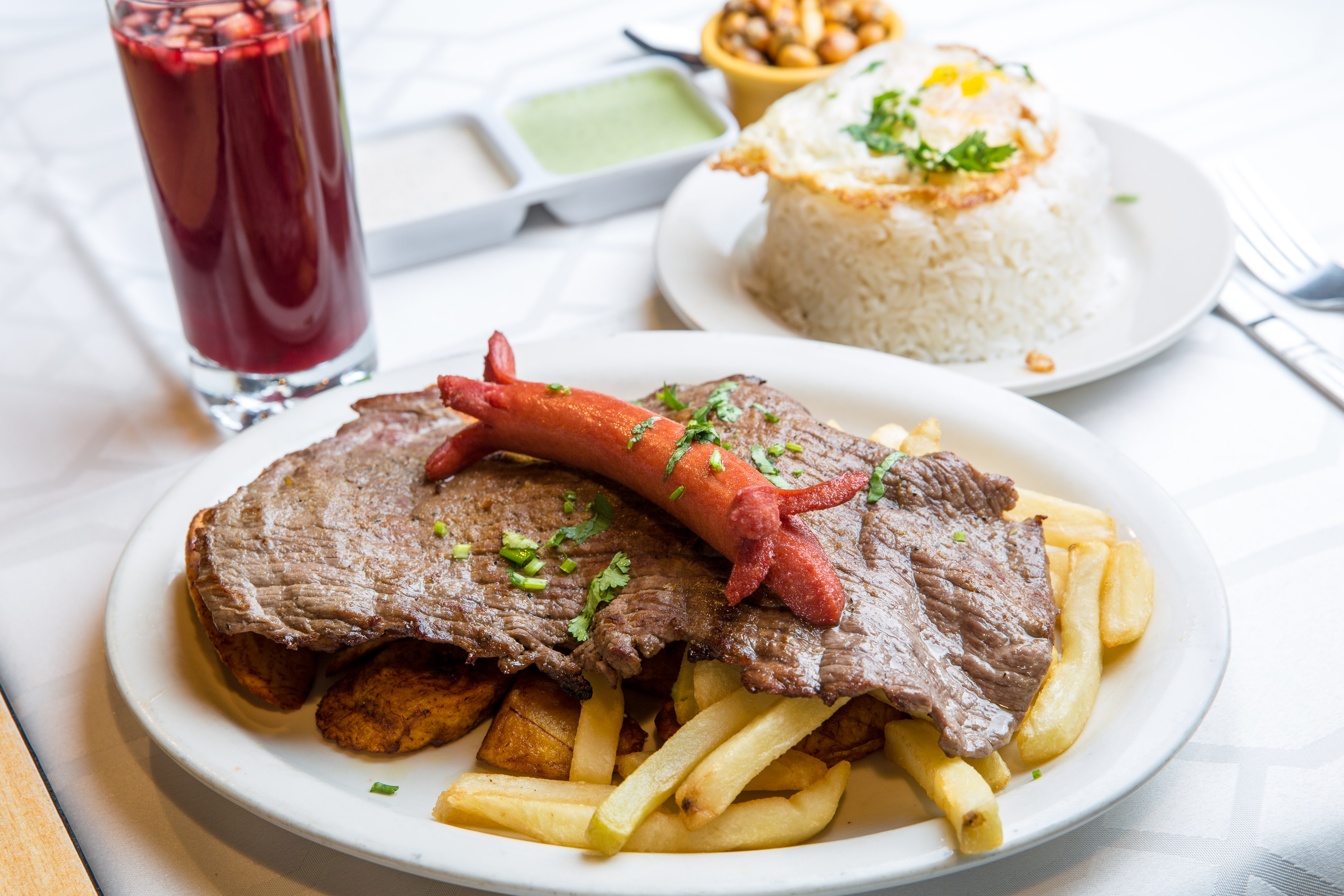 Order Bistec a lo Pobre food online from Riko Peruvian Cuisine store, Queens on bringmethat.com