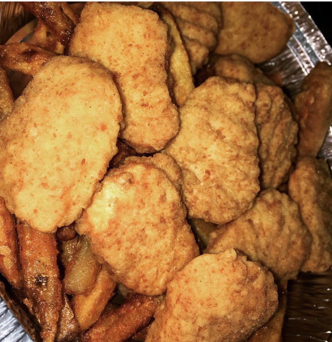 Order 6 Pieces Nuggets with Fries food online from Halal Munchies store, Queens on bringmethat.com