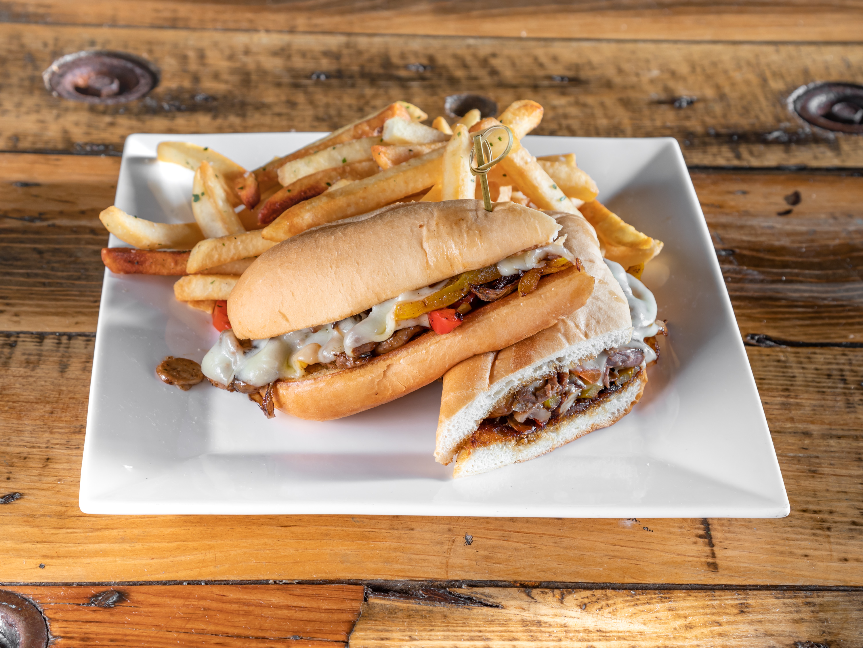 Order PHILLY CHEESE STEAK food online from Keg & Lantern Brewing store, Brooklyn on bringmethat.com