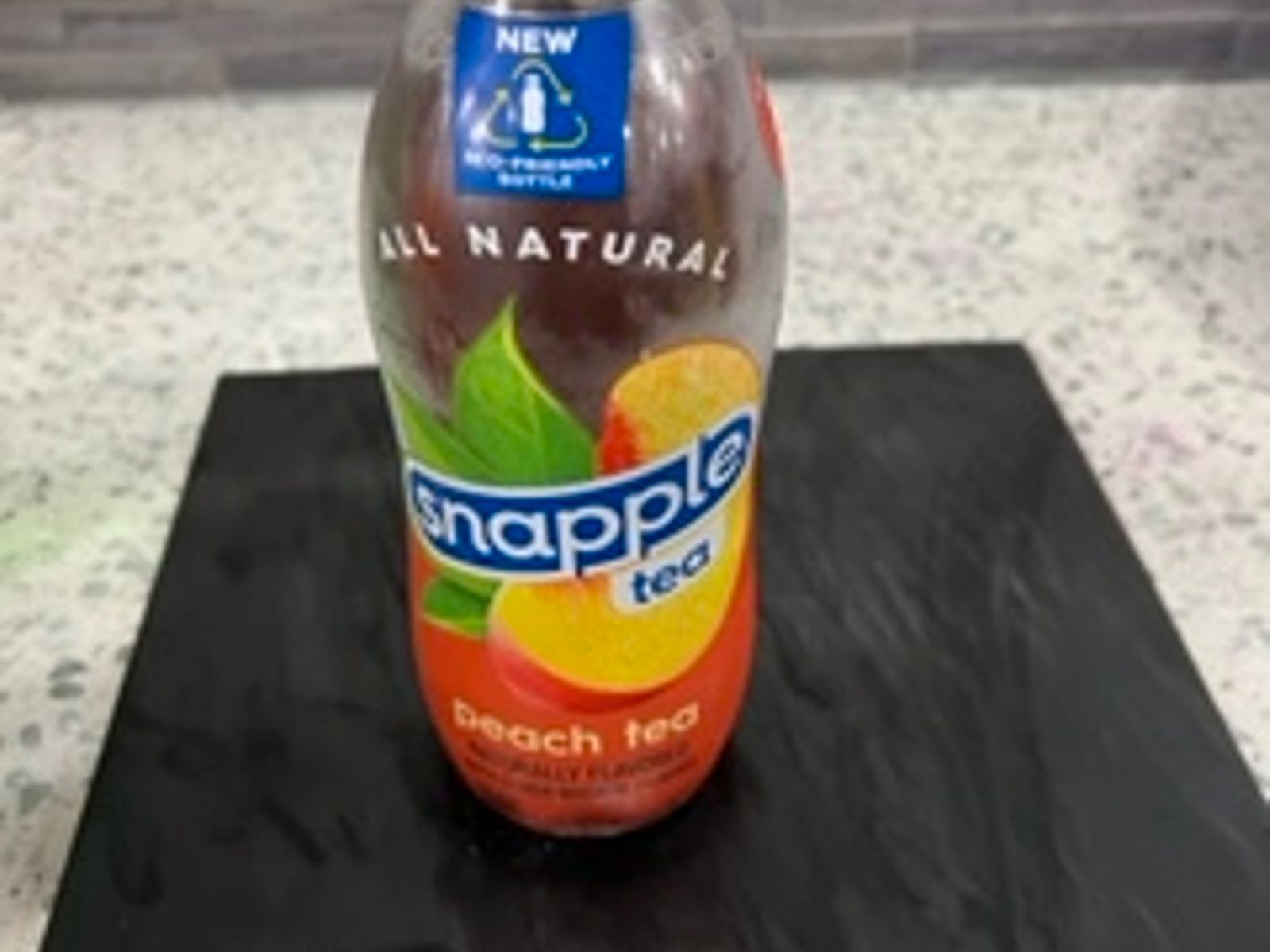 Order Peach Snapple food online from Halal Munchies store, Queens on bringmethat.com