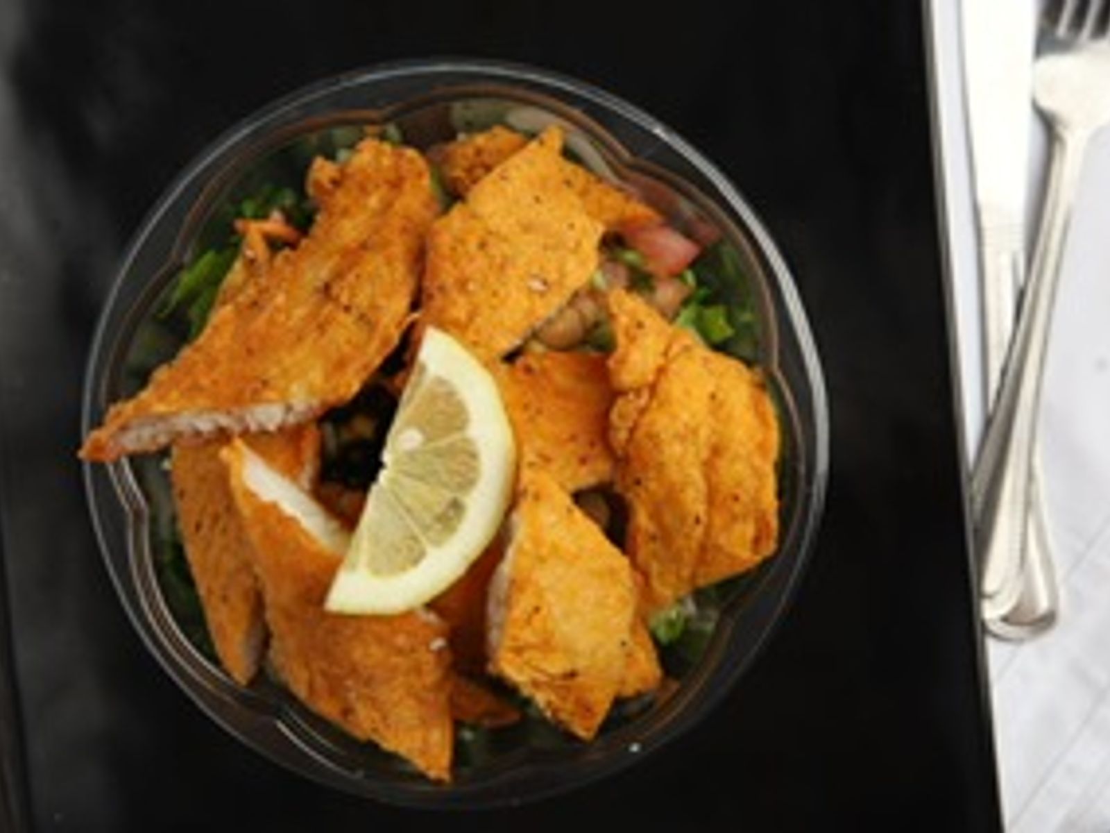 Order Fish Salad food online from Halal Munchies store, Queens on bringmethat.com