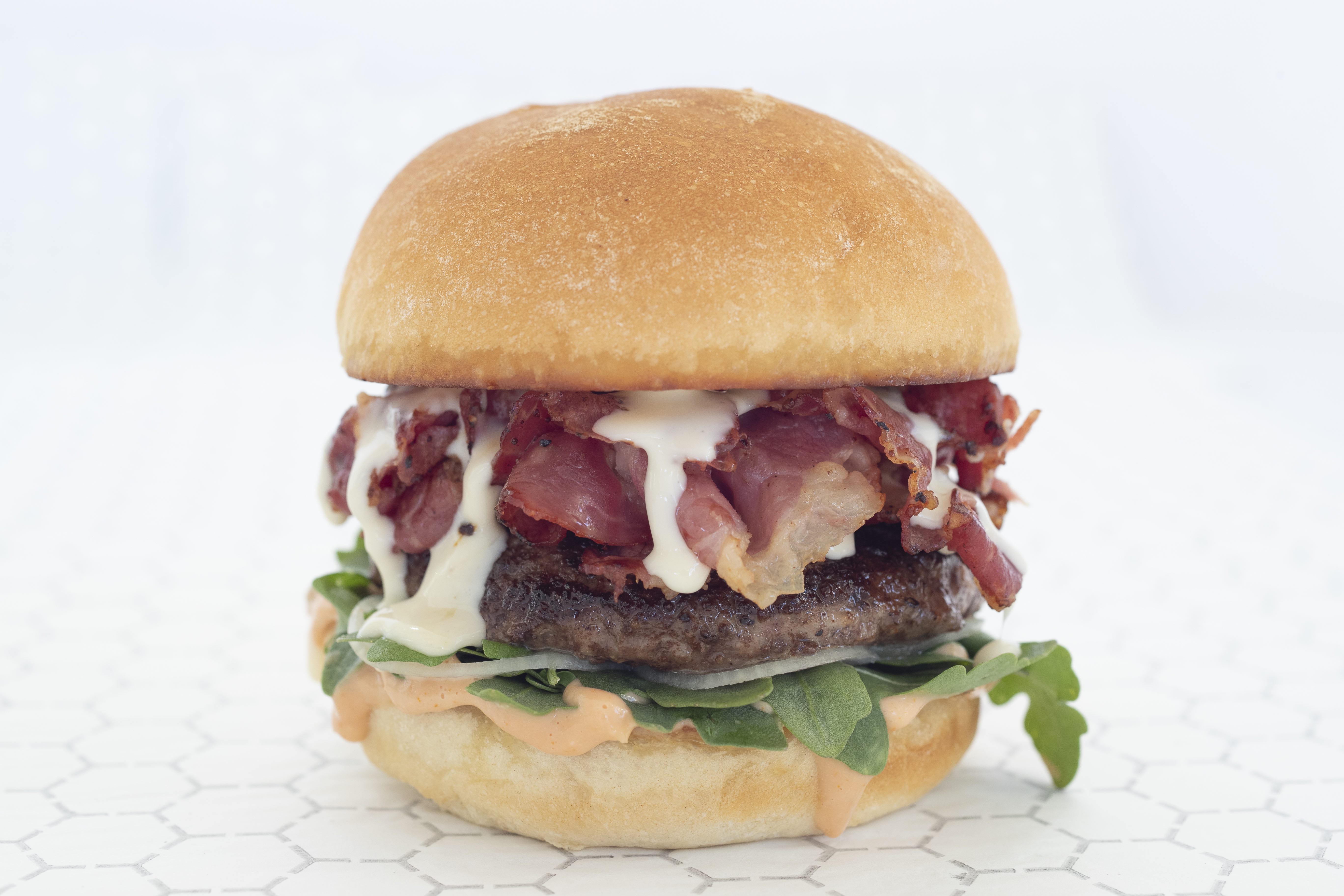 Order Pastrami Burger food online from Top Round store, Dallas on bringmethat.com