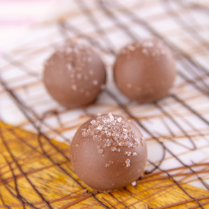 Order Creme-Brulee Bite-Size Truffle, Milk Chocolate food online from Wockenfuss Candies store, Columbia on bringmethat.com