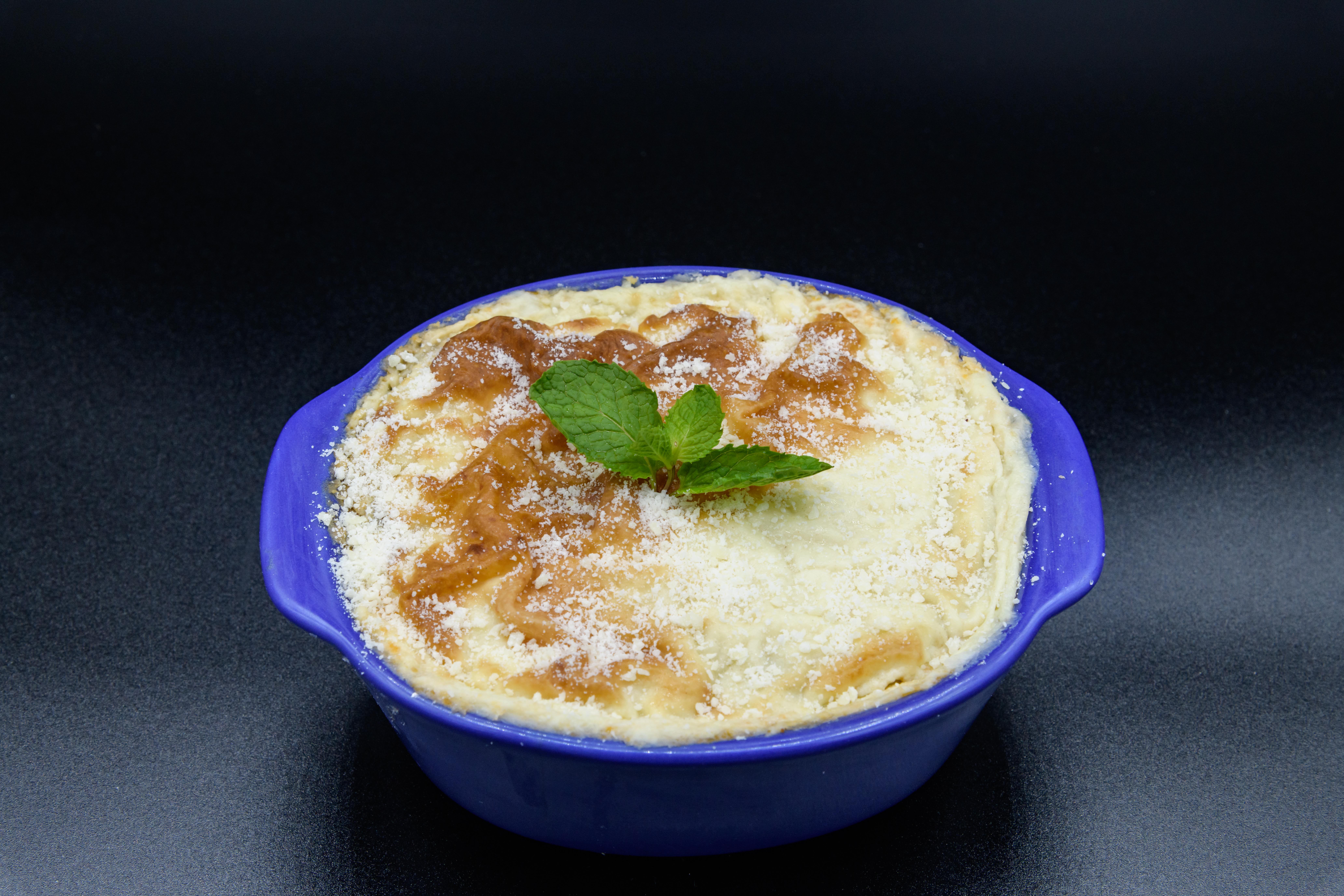 Order Mousaka food online from Gyro City store, Brighton on bringmethat.com
