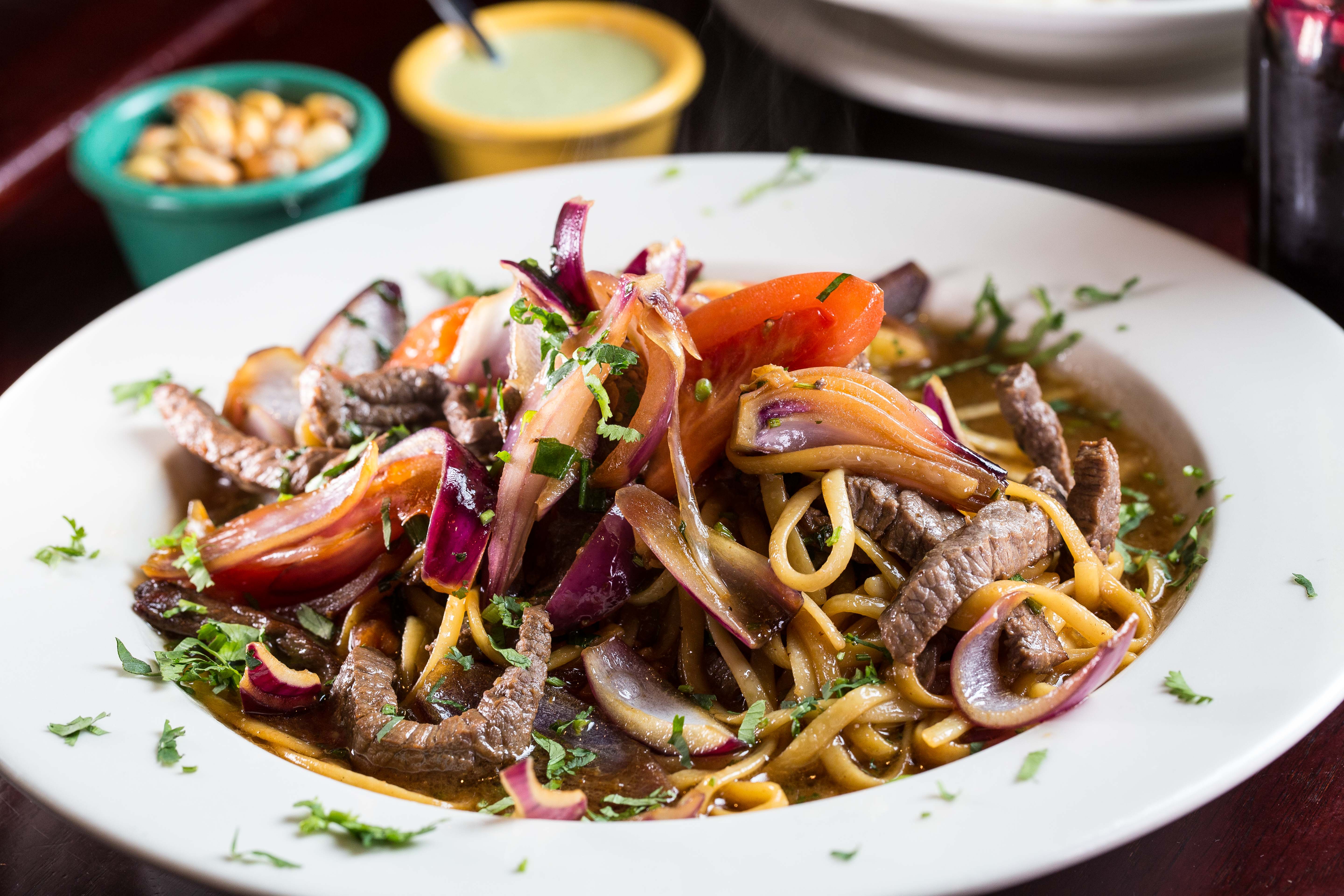 Order Tallarin Saltado de Carne food online from Riko Peruvian Cuisine store, Queens on bringmethat.com