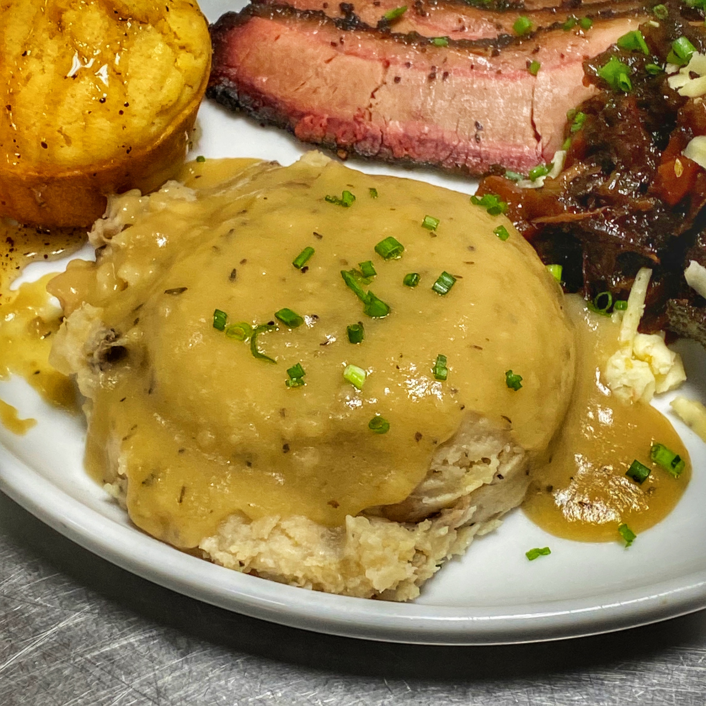 Order Mashed Potatoes & Gravy food online from Great Northern Bbq store, Providence on bringmethat.com