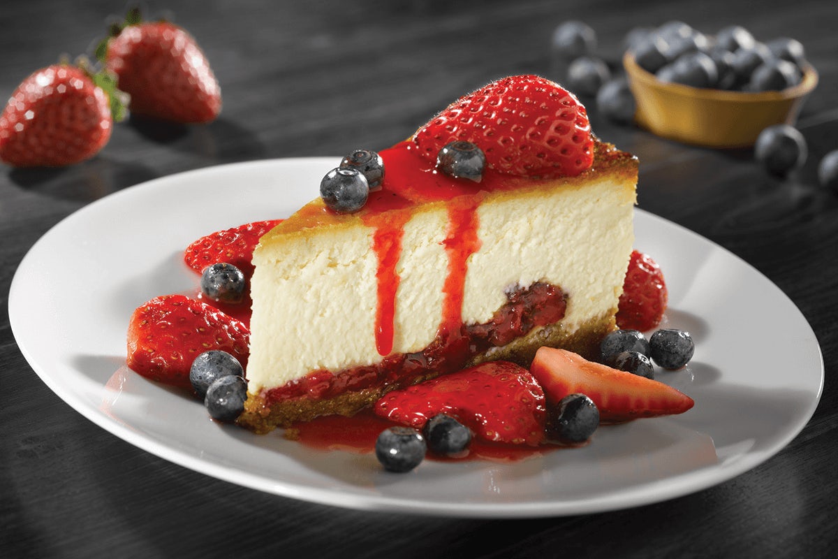 Order CHEESECAKE WITH FRESH BERRIES food online from Old Chicago 66 store, Lakewood on bringmethat.com