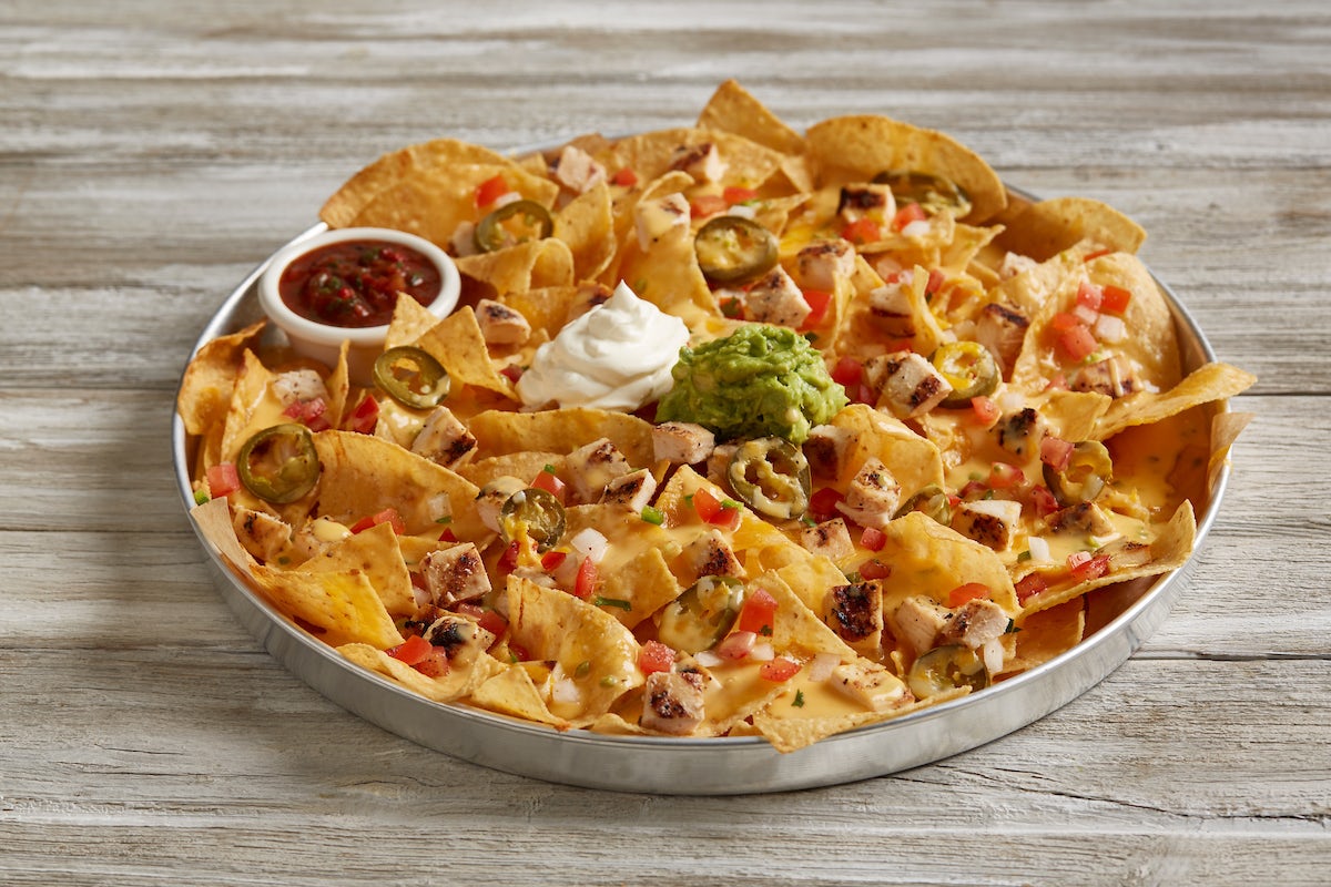 Order Loaded Nachos food online from BJ's Restaurant & Brewhouse store, Waco on bringmethat.com