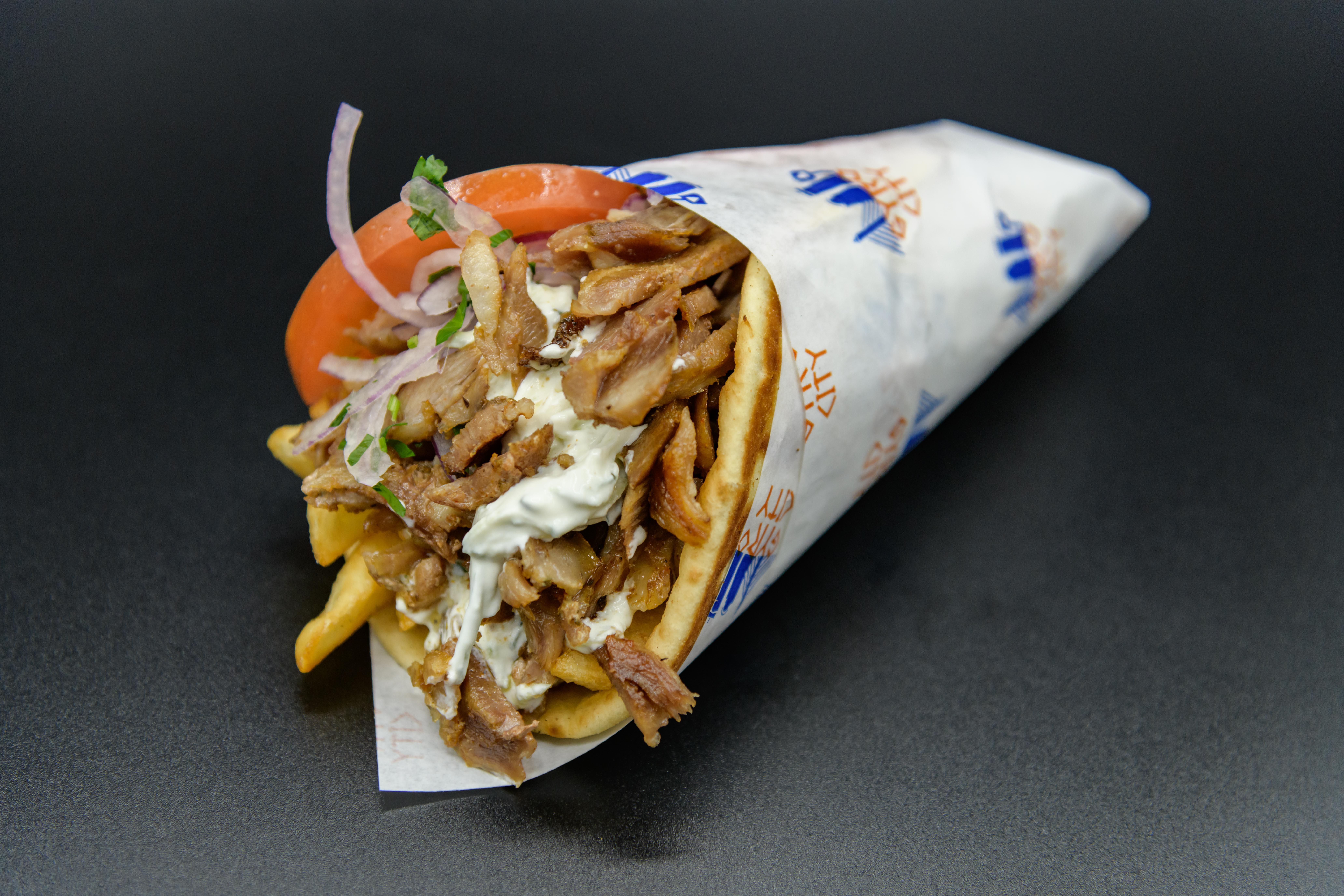 Order Pork gyro pita food online from Gyro City store, Brighton on bringmethat.com
