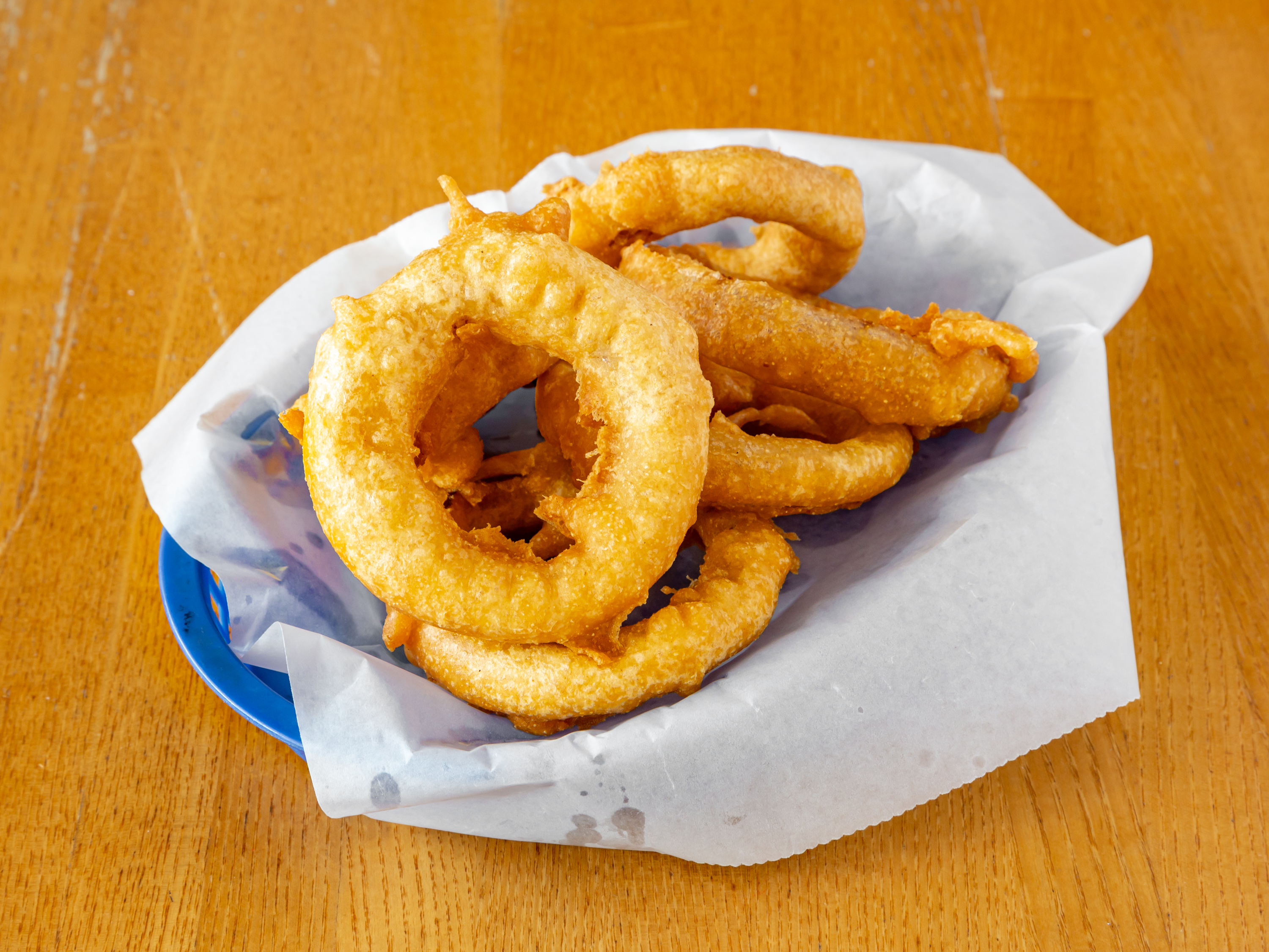 Order Beer Battered Onion Rings food online from Joshua's Kitchen store, Mulberry on bringmethat.com