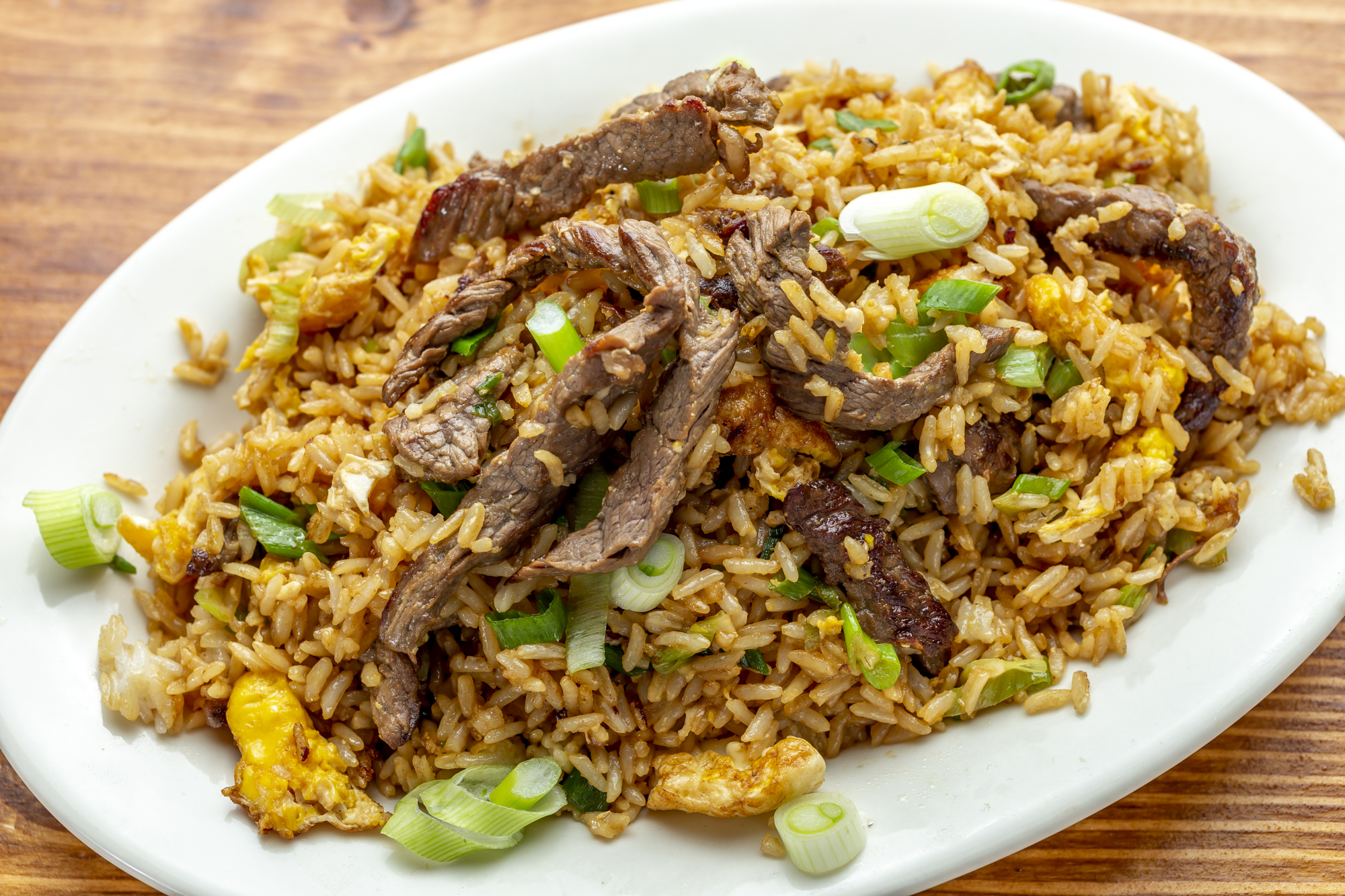 Order Arroz Chaufa de Carne food online from Riko Peruvian Cuisine store, Queens on bringmethat.com