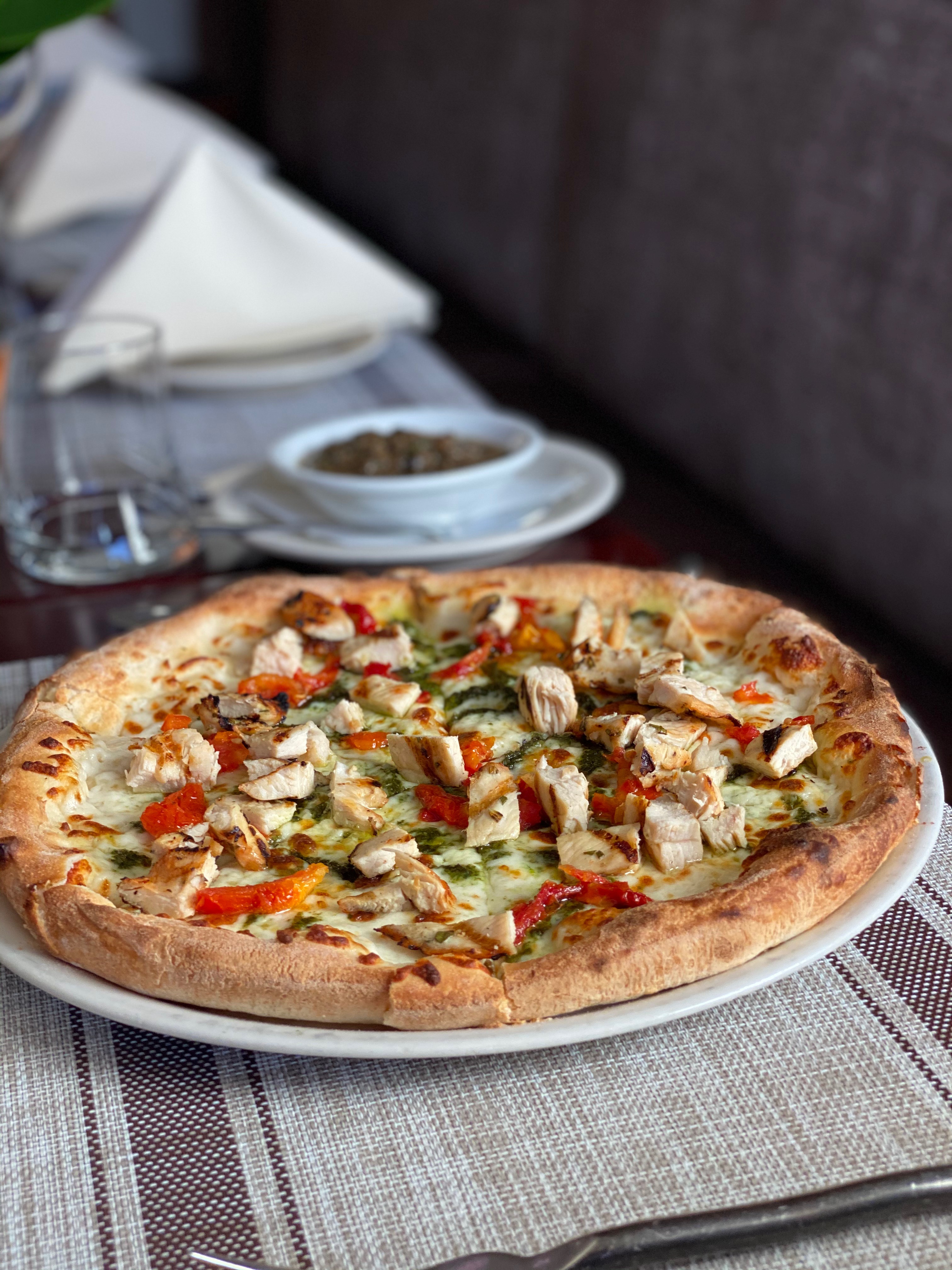 Order Pollo e Pesto Pizza food online from Tramonto Bistro store, Malibu on bringmethat.com