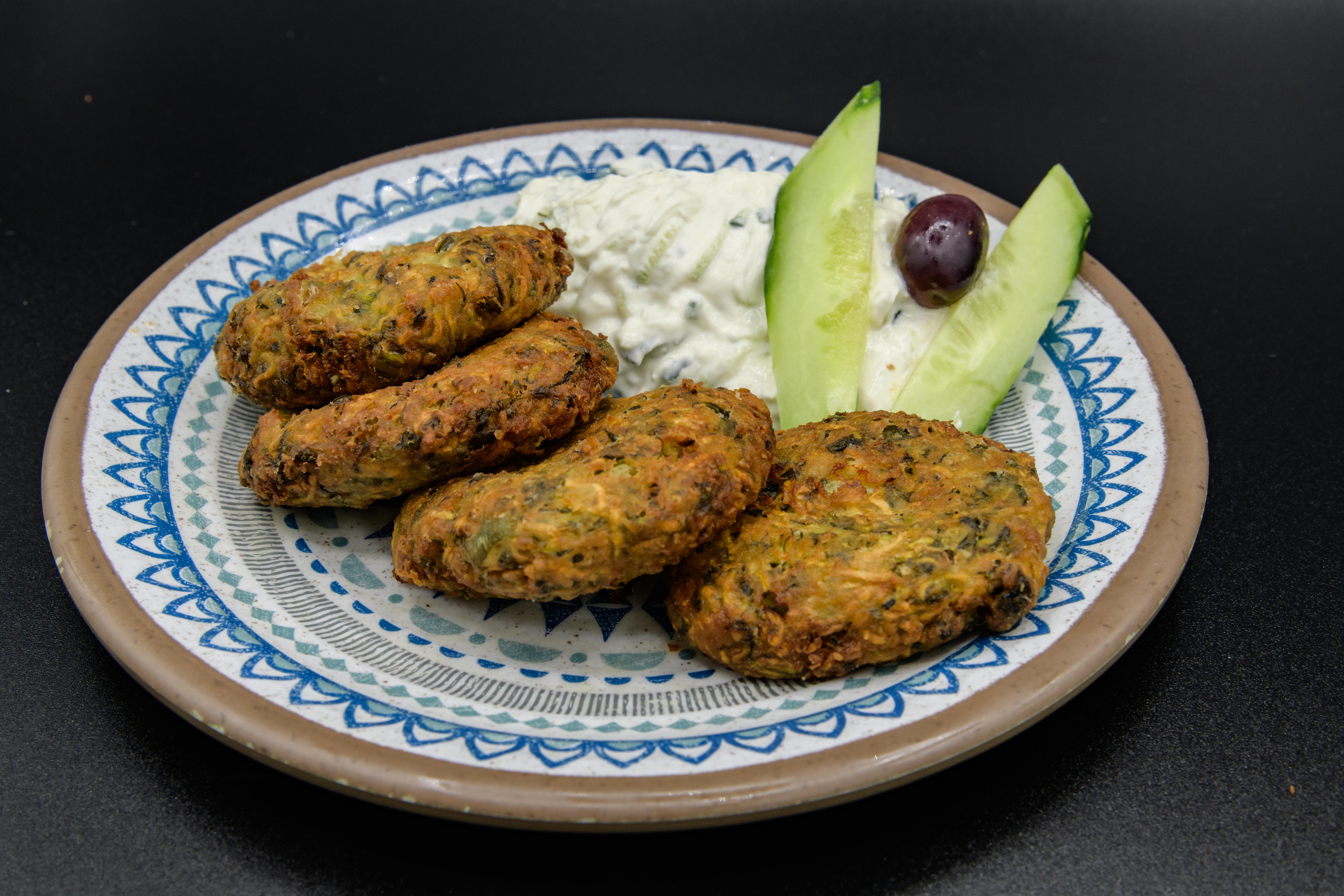 Order Kolokithokeftedes food online from Gyro City store, Brighton on bringmethat.com