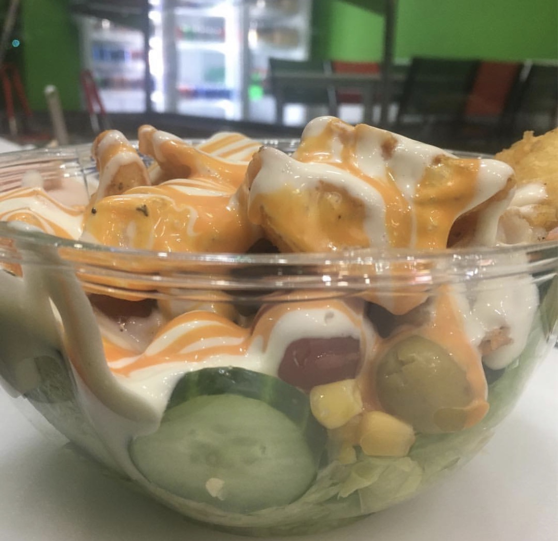 Order Fish Salad food online from Halal Munchies store, Queens on bringmethat.com