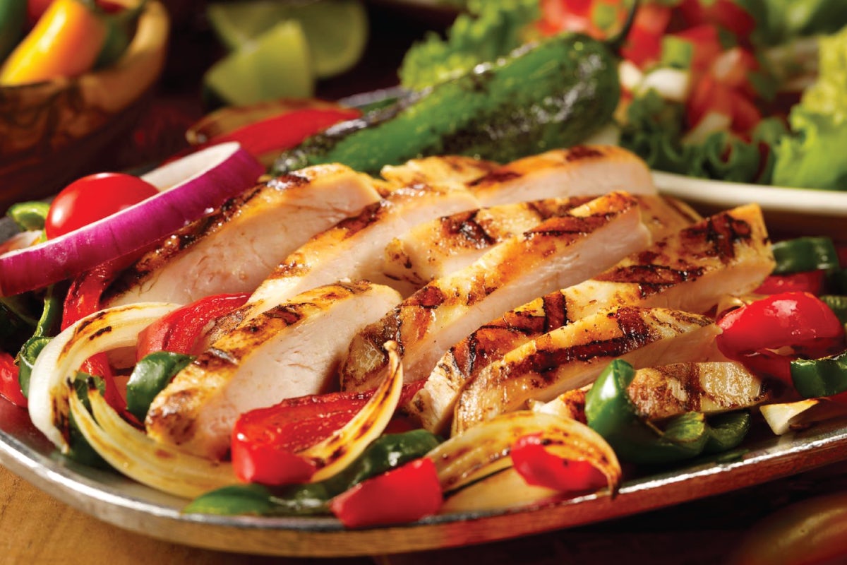 Order Steak and/or Chicken Fajitas for One food online from Uncle Julio's store, Brentwood on bringmethat.com