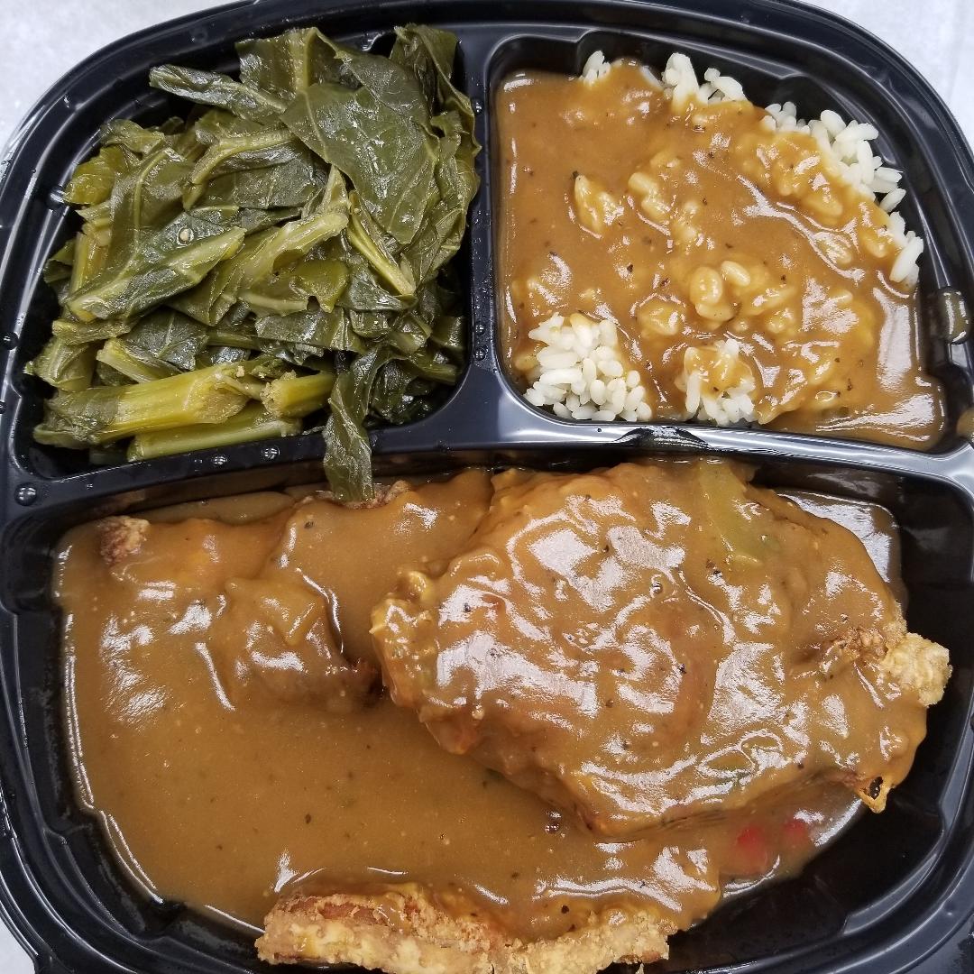 Order Smothered Turkey Chops over Rice Combo food online from Tan Finger Lickin Chicken store, Philadelphia on bringmethat.com