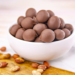 Order Milk Chocolate Covered Peanuts food online from Wockenfuss Candies store, Columbia on bringmethat.com