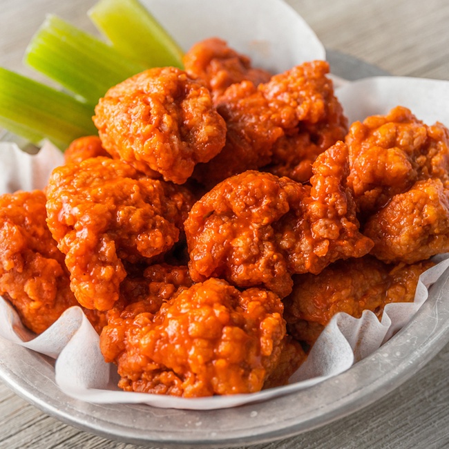 Order 10 Boneless food online from Hurricane Grill & Wings store, Syosset on bringmethat.com