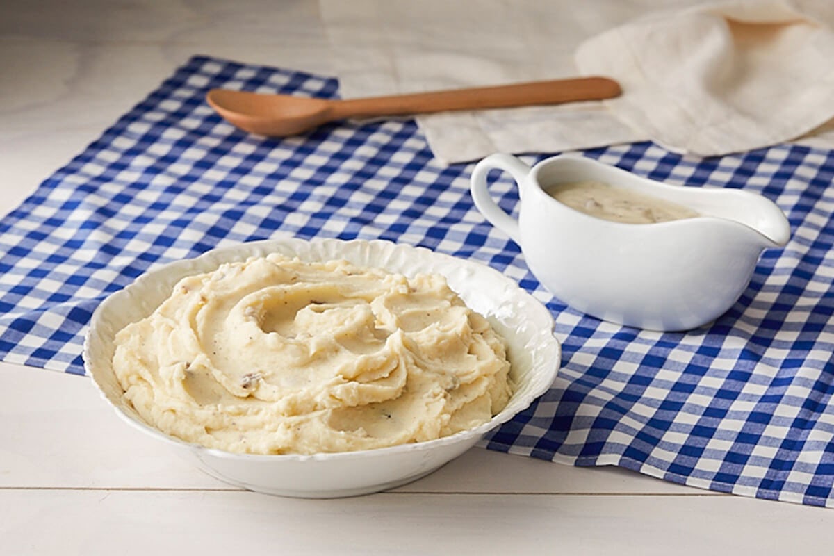 Order Mashed Potatoes w/Sawmill Gravy food online from Cracker Barrel store, Rochester on bringmethat.com
