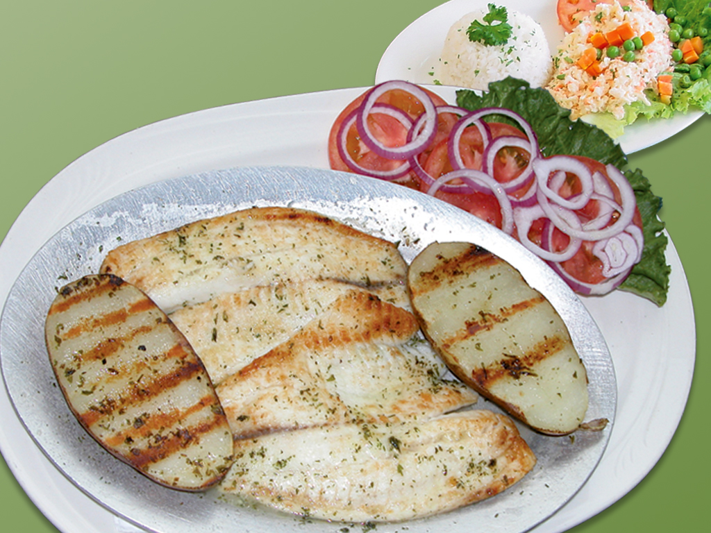 Order 60. Tilapia a la Salamandra food online from Cositas Ricas Corp store, Queens on bringmethat.com
