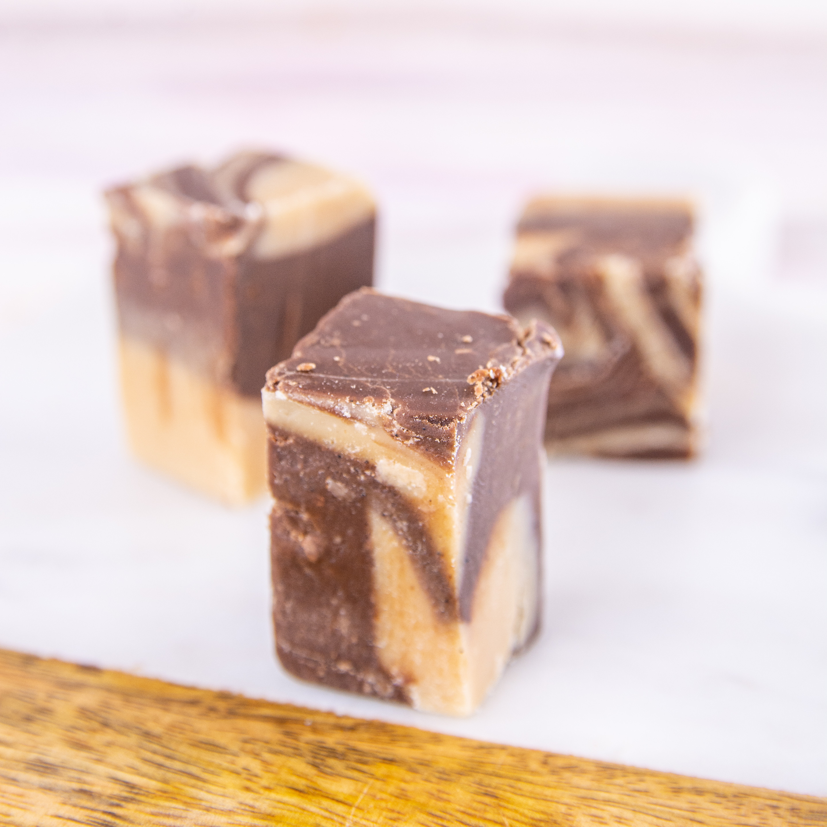 Order Peanut Butter and Chocolate Fudge, 1 lb. food online from Wockenfuss Candies store, Columbia on bringmethat.com