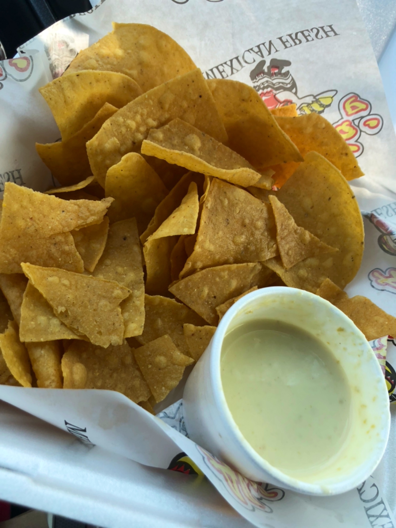Order Chips with Queso food online from Abelardo's Mexican Fresh store, Omaha on bringmethat.com