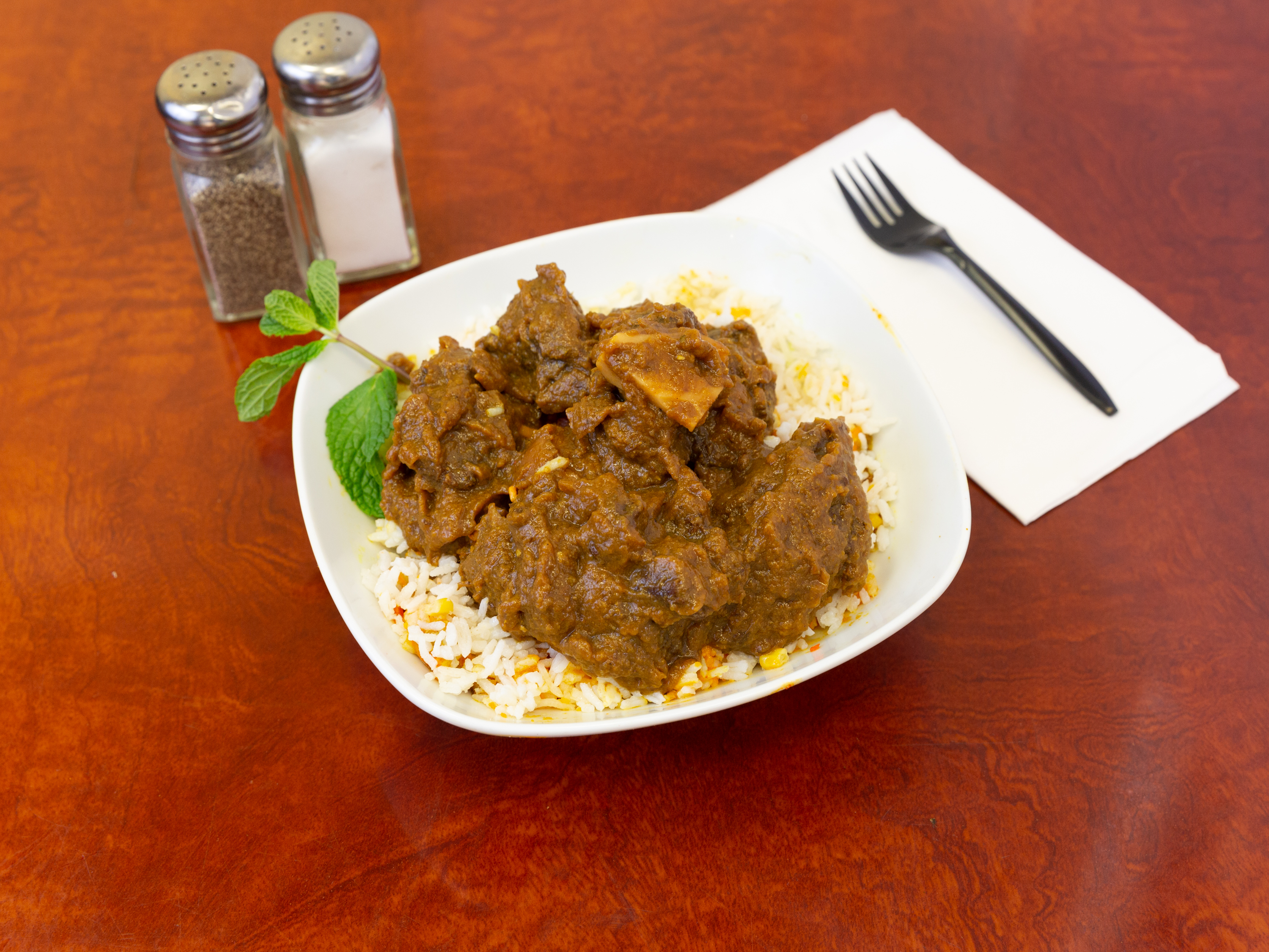 Order Goat Curry food online from Golden Indian Grill store, Los Angeles on bringmethat.com