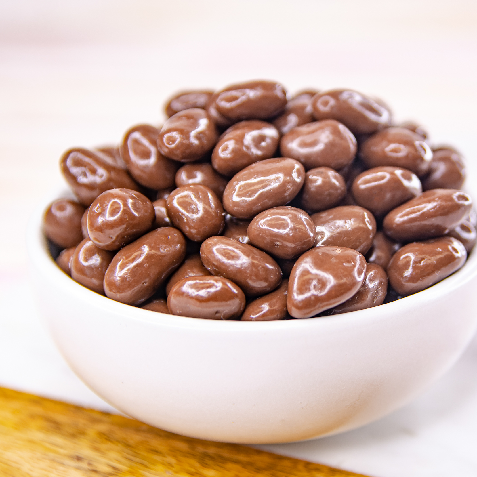 Order Milk Chocolate Covered Raisins food online from Wockenfuss Candies store, Columbia on bringmethat.com