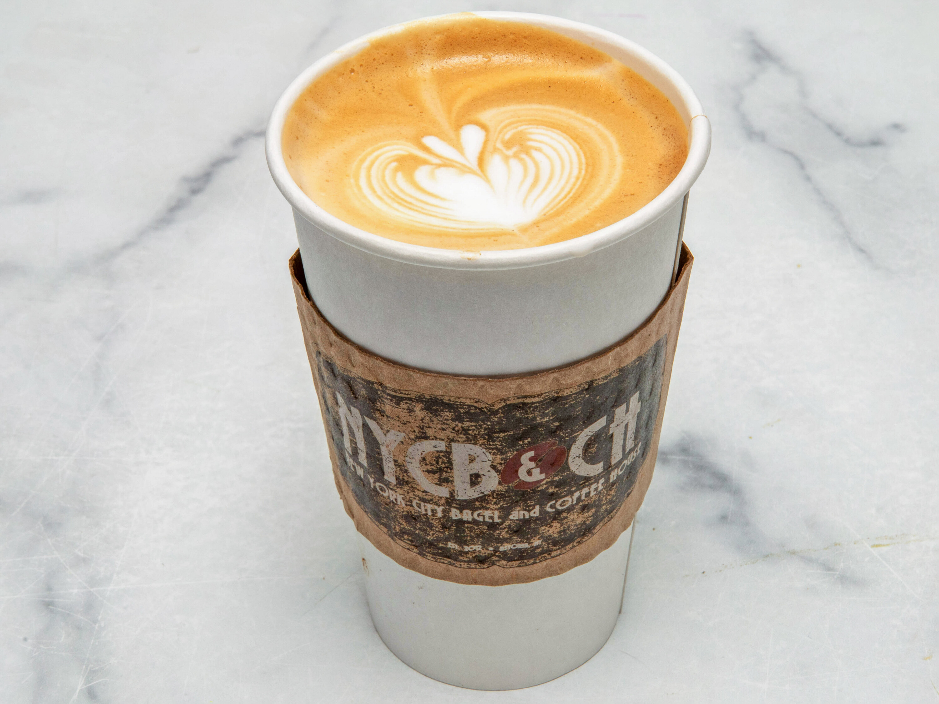 Order Hot Latte food online from NYC Bagel and Coffee House store, Queens on bringmethat.com