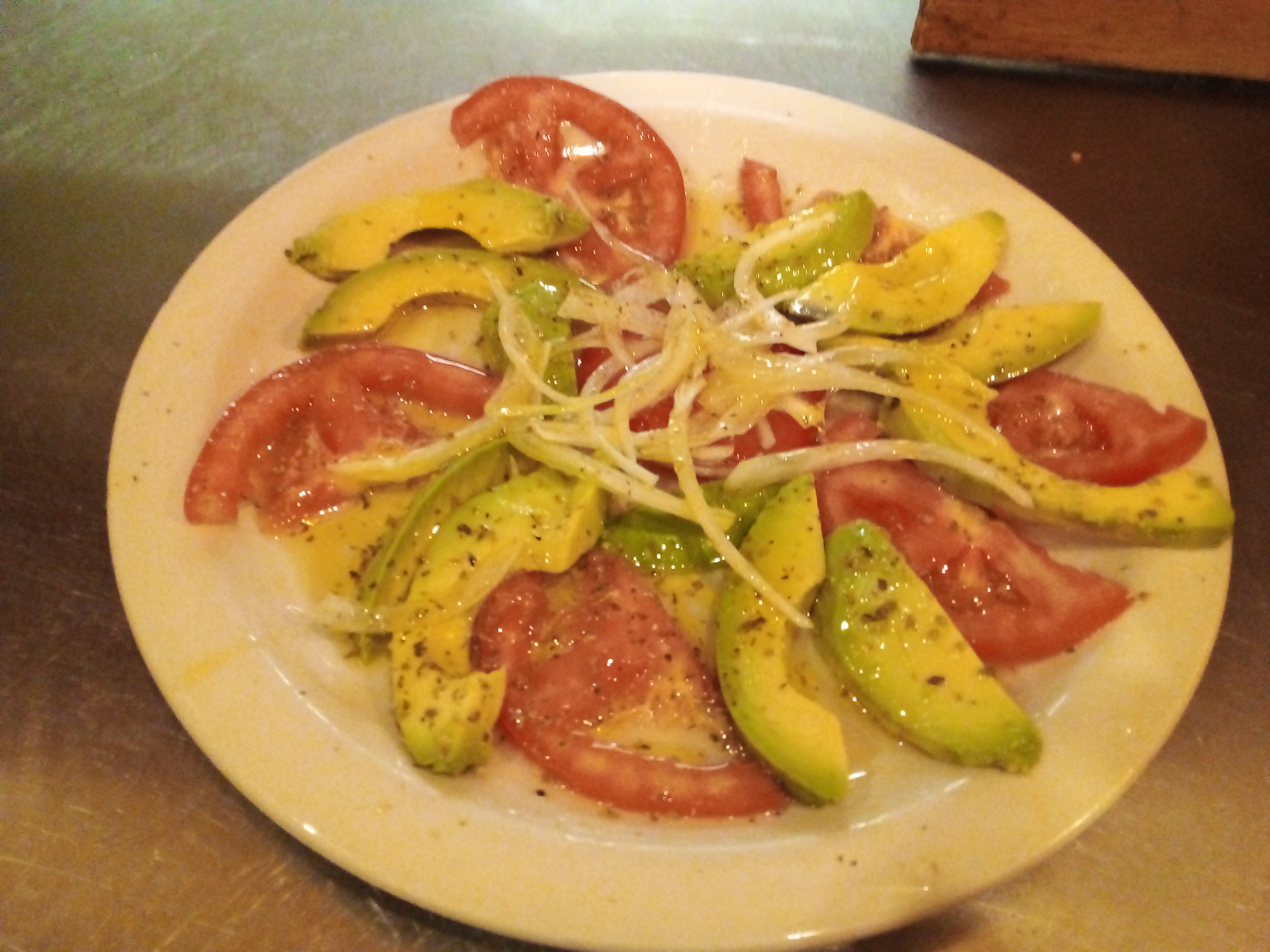 Order Avocado Tomato Salad food online from La Teresita Restaurant store, Pinellas Park on bringmethat.com