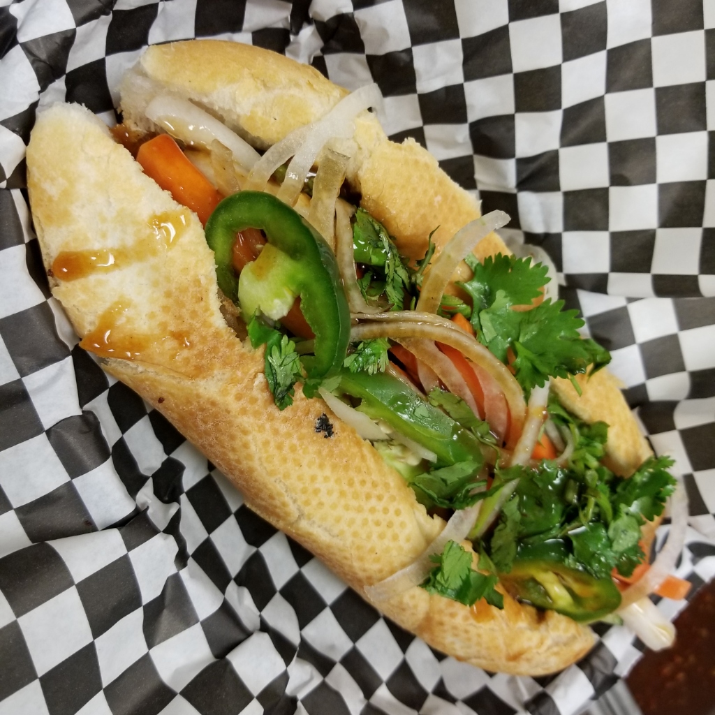 Order Griled Pork Banh Mi Sandwich food online from Em Kajun Asian Cuisine store, Haltom City on bringmethat.com