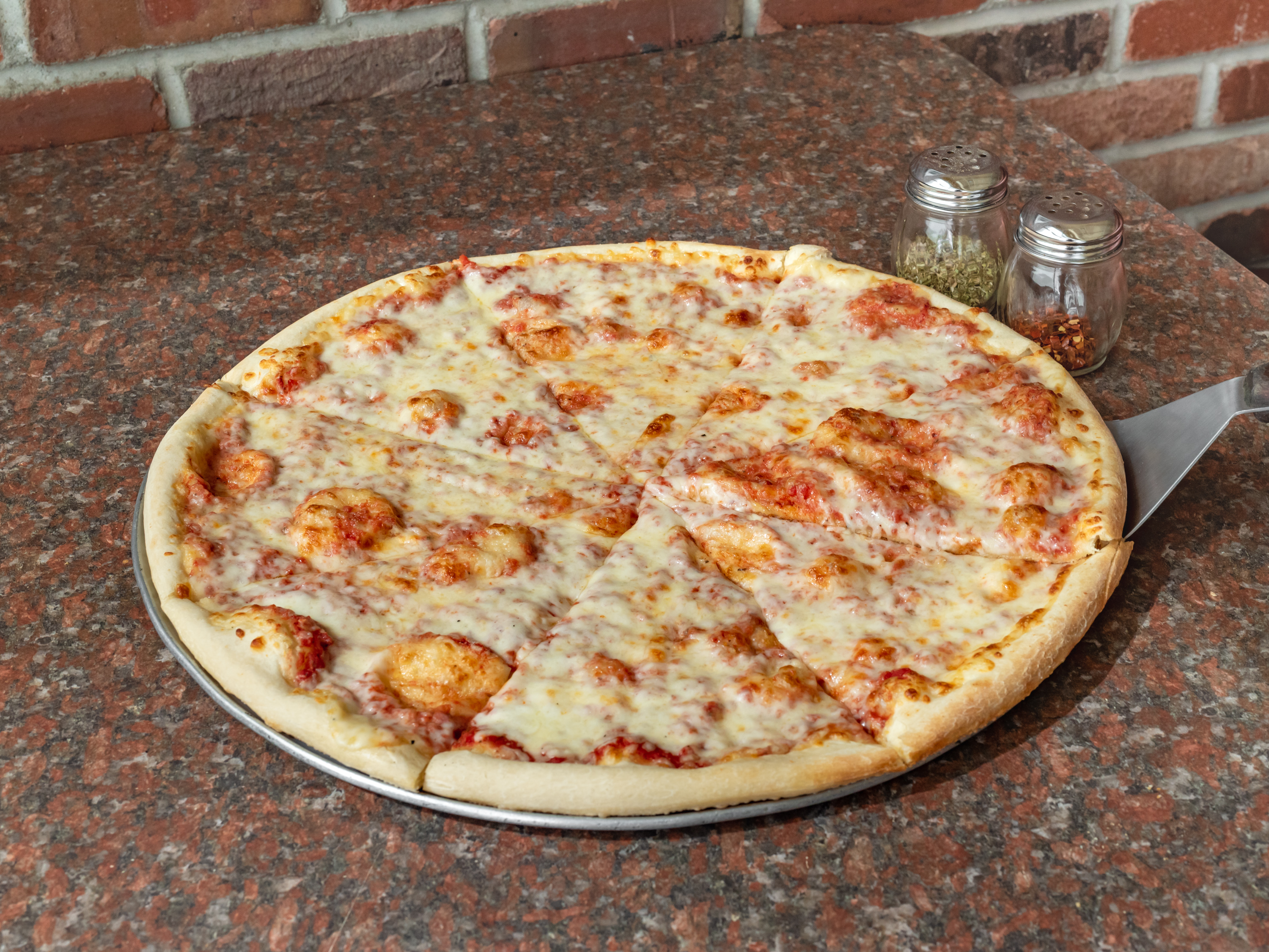 Order Cheese Pizza food online from Abo's Pizza store, Denver on bringmethat.com